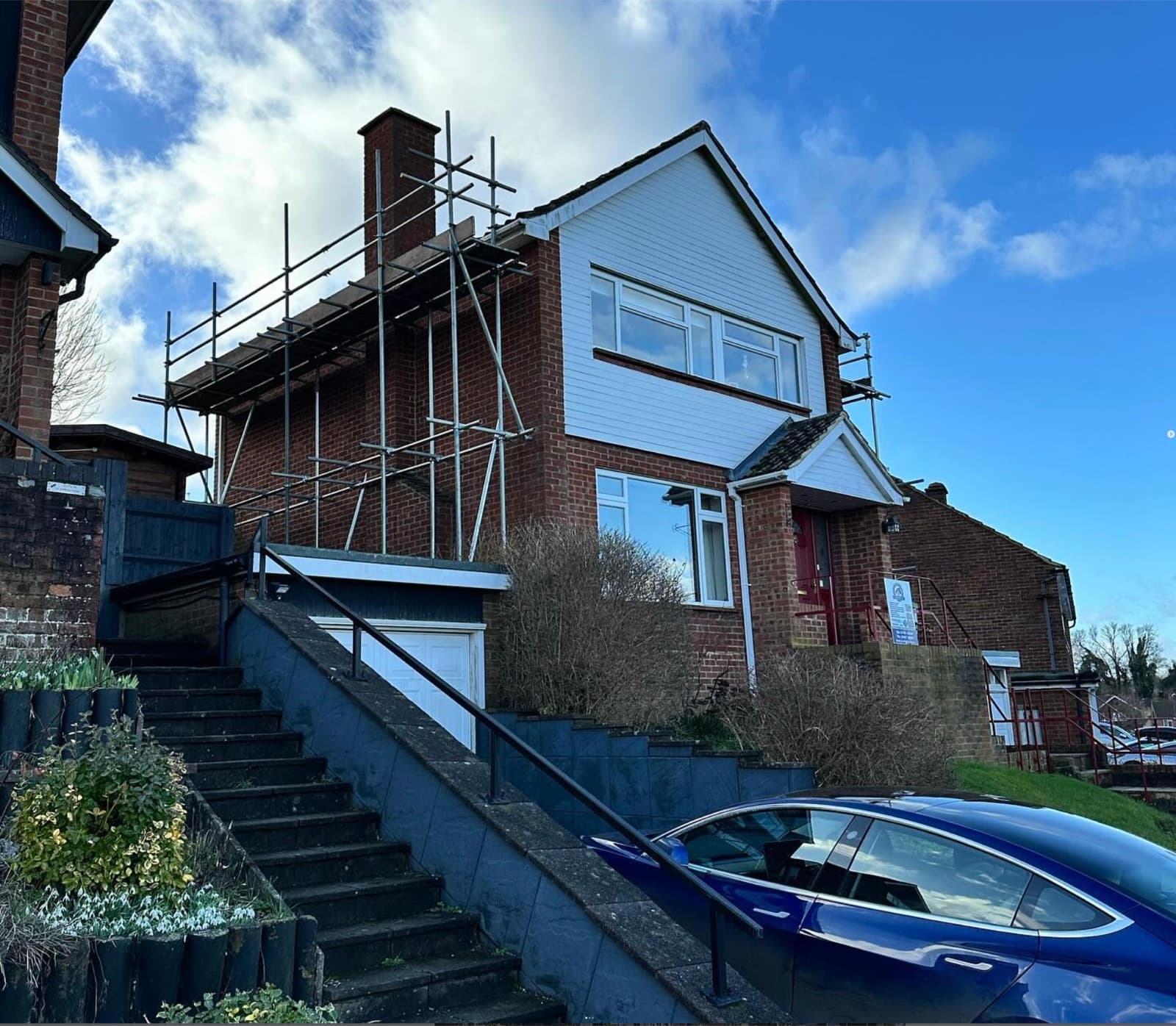 Semi-detached house scaffolded for chimney access, London — Rocket Scaffolding